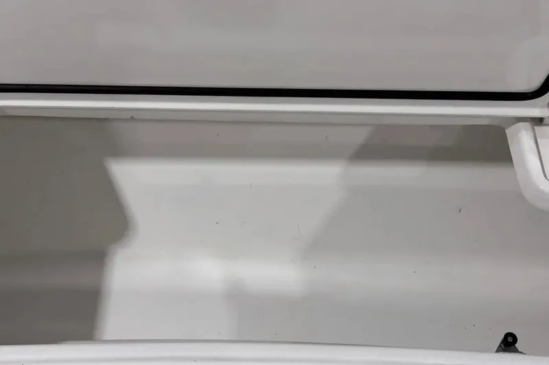 Slide: The Image of Open storage compartment of 2024 Contender 44 ST boat, showcasing interior space. - 32