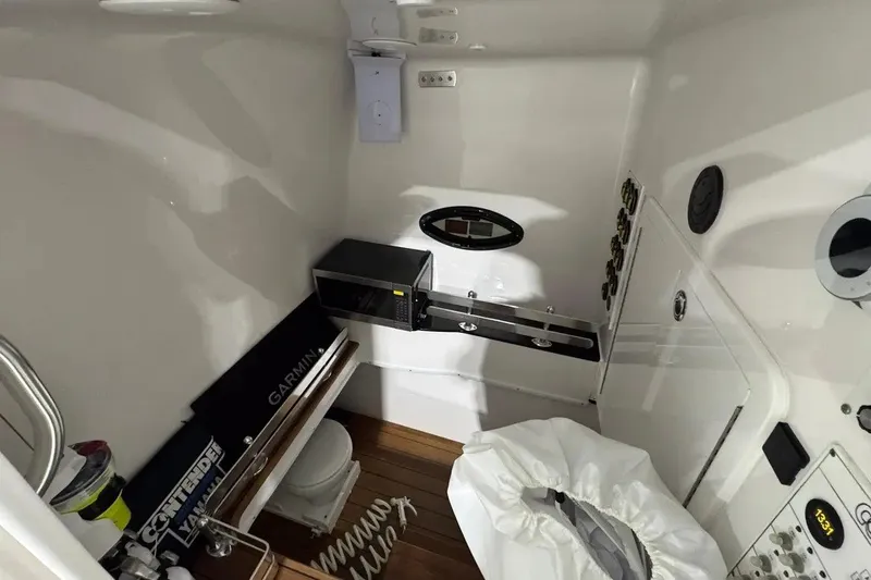 Slide: The Image of 2024 Contender 44 ST cabin interior with modern amenities and sleek design. - 27