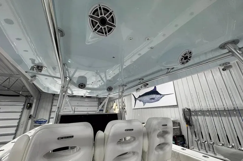 Slide: The Image of Interior view of 2024 Contender 44 ST boat with speakers and fishing gear. - 38
