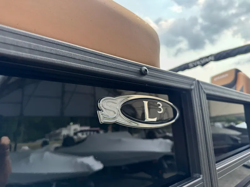 Slide: The Image of Close-up of the 2026 Sylvan L3 RLZ, showing the logo and exterior detailing. - 19