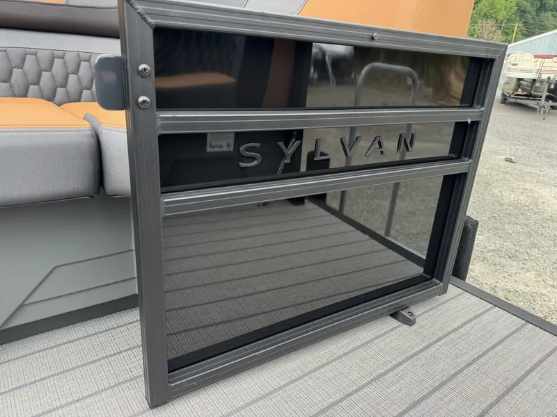 Slide: The Image of A modern Sylvan boat detail with gray and orange seating and textured flooring. - 28