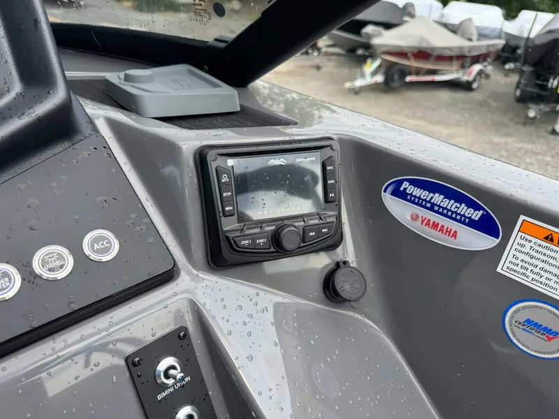 Slide: The Image of The image shows the dashboard of a Sylvan L3 RLZ boat featuring a Yamaha system. - 15