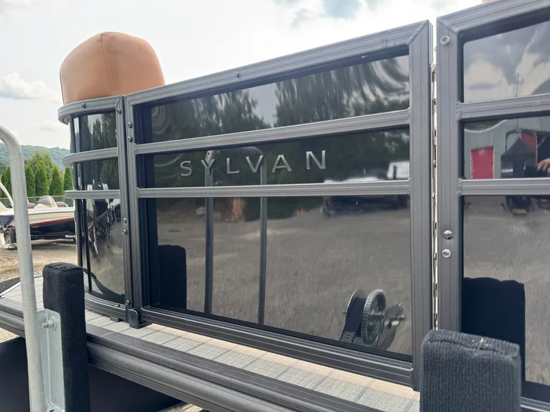 Slide: The Image of Close-up of the 2026 Sylvan L3 RLZ with shiny black railing. - 29