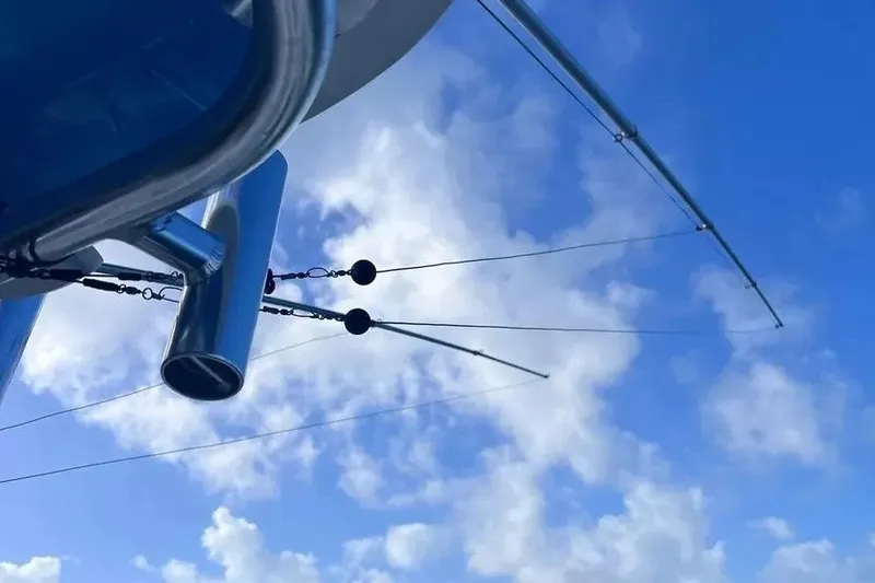 Slide: The Image of Outriggers on a 2024 Contender 30 Tournament boat against a blue sky backdrop. - 12