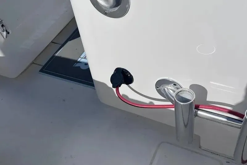 Slide: The Image of 2024 Contender 30 Tournament boat deck with rod holder and electrical outlet. - 5
