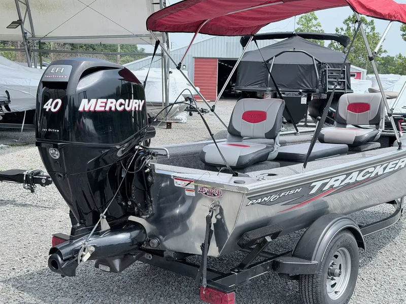 Slide: The Image of A 2016 Tracker Panfish 16 boat with a Mercury 40 outboard motor, on a trailer. - 24