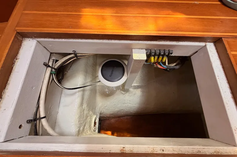 Slide: The Image of Bilge compartment of 2005 Tayana 48 yacht with wiring and equipment. - 112