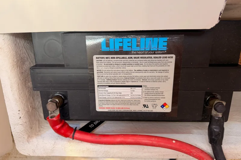Slide: The Image of Lifeline battery in a 2005 Tayana 48 yacht, featuring AGM technology and sealed lead acid. - 118