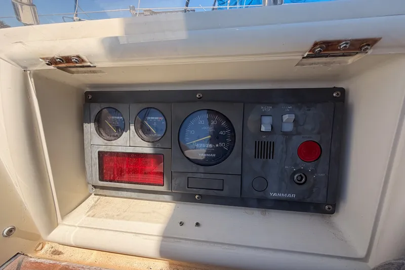 Slide: The Image of Control panel of a 2005 Tayana 48 sailboat with Yanmar engine gauges. - 35