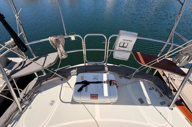 Slide: The Image of Deck view of 2005 Tayana 48 sailboat with safety equipment and ropes. - 27