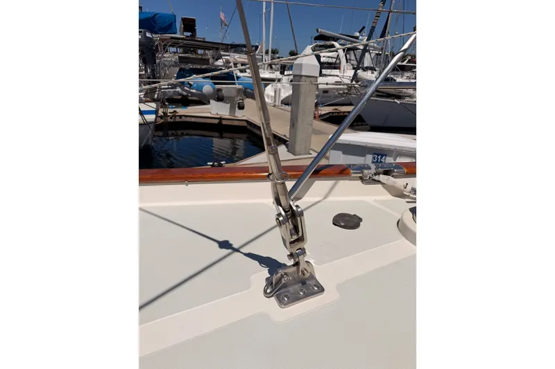 Slide: The Image of Deck view of 2005 Tayana 48 sailboat with rigging details in marina. - 16