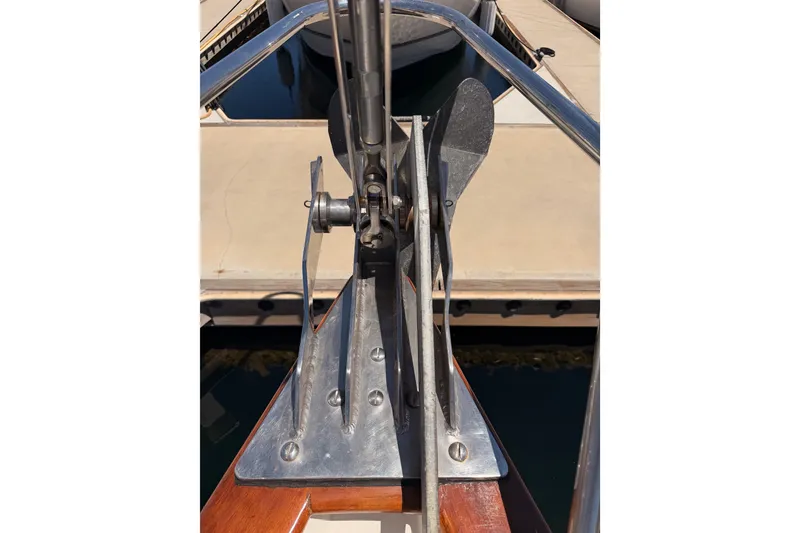 Slide: The Image of Bow of 2005 Tayana 48 yacht with anchor and polished metal fittings. - 19