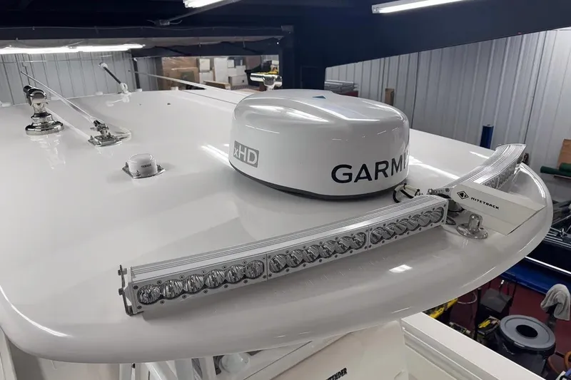 Slide: The Image of 2022 Contender 32 ST boat with Garmin radar and NiteTrack light bar on the roof. - 6