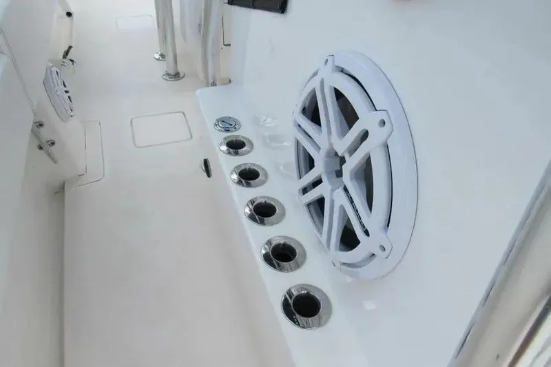 Slide: The Image of 2019 Contender 39 ST boat interior with speaker and cup holders. - 9