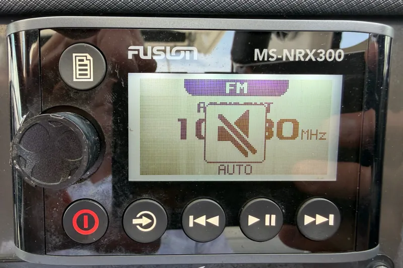 Slide: The Image of Fusion MS-NRX300 radio display on 2018 Monterey 378SE Super Express, showing FM frequency. - 25