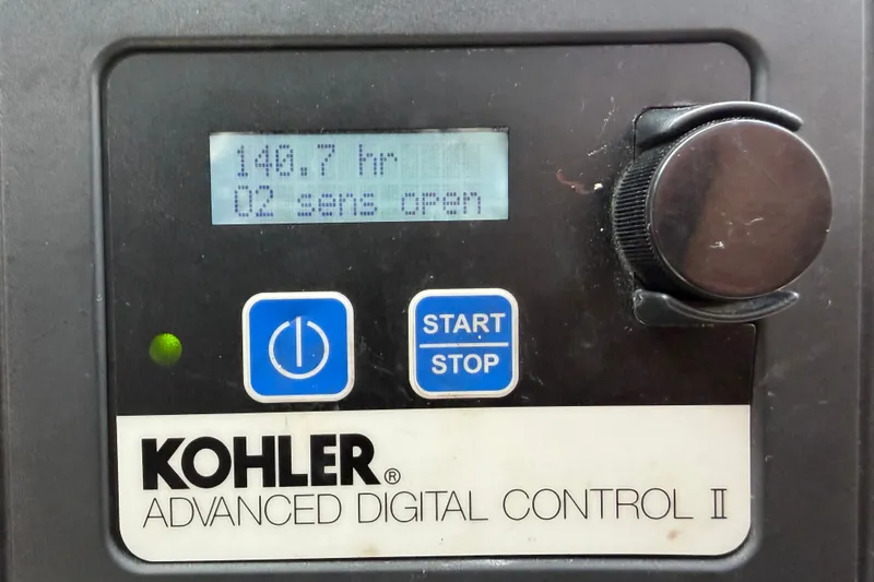 Slide: The Image of Kohler Advanced Digital Control II panel displaying 140.7 hours on a 2018 Monterey 378SE Super Express. - 32