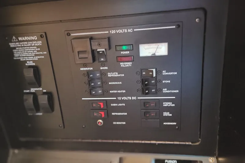 Slide: The Image of Electrical control panel of a 2004 Sea Ray Sundancer 280 boat. - 15