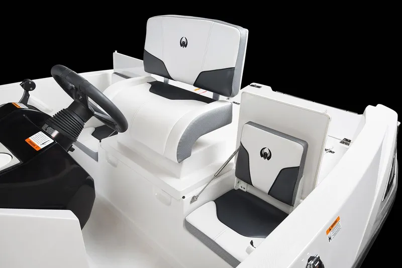 Slide: The Image of The image shows the interior of a 2019 Scarab 195 Open G boat with modern seating. - 9