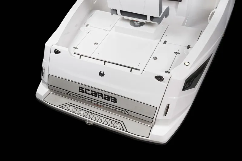Slide: The Image of The image shows the stern of a white 2019 Scarab 195 Open G boat. - 11