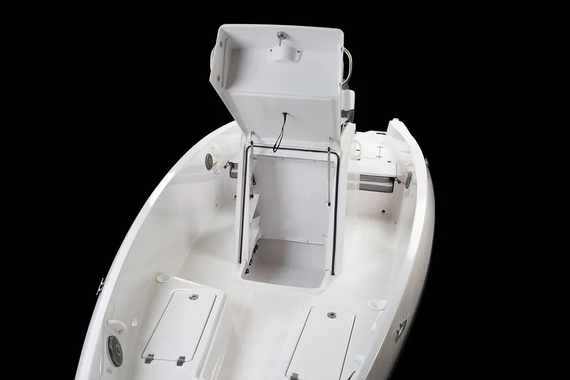 Slide: The Image of The image shows the open deck of a 2019 Scarab 195 Open G boat with storage space. - 4
