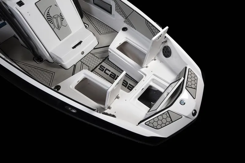 Slide: The Image of The image shows the deck of a 2019 Scarab 195 Open ID boat with storage compartments. - 11