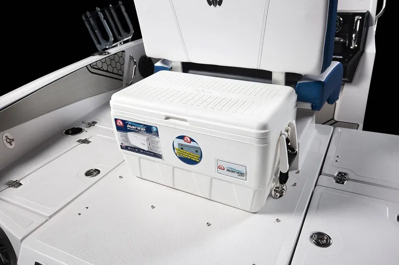 Slide: The Image of A white cooler sits on the deck of a 2019 Scarab 195 Open ID boat. - 18
