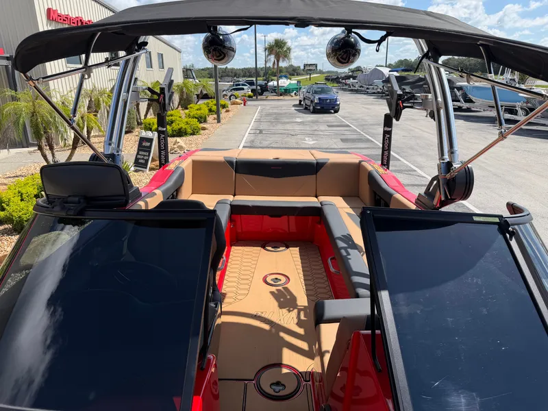 Slide: The Image of The image shows the cockpit of a 2022 MasterCraft NXT24 with modern seating and speakers. - 10