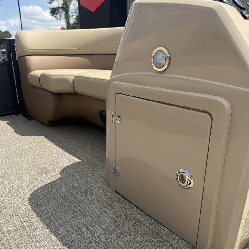 Slide: The Image of The image shows the cockpit of a 2022 Viaggio L20U with beige seating and storage. - 27