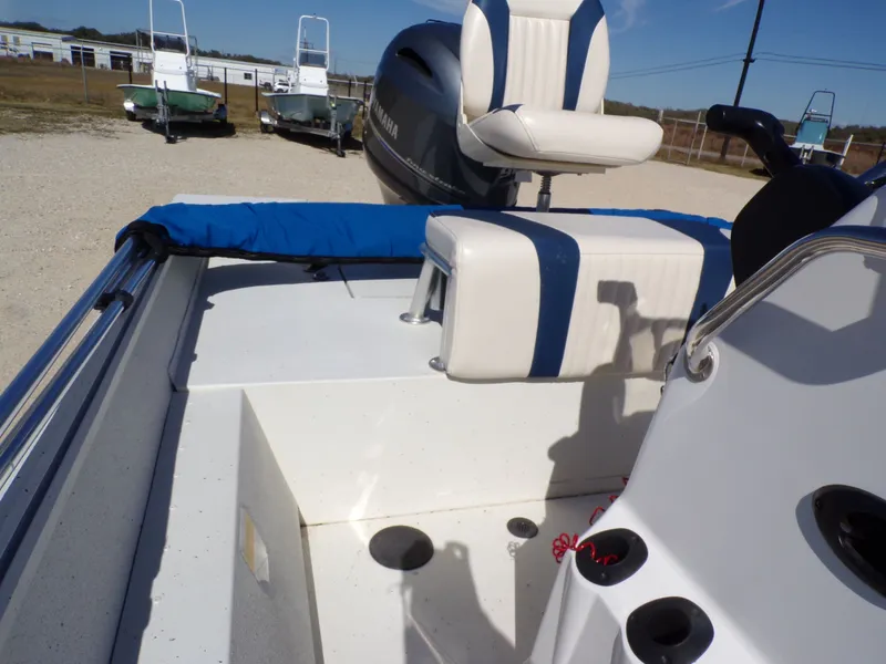 Slide: The Image of The image shows the cockpit of a 2018 G3 Bay 18 boat with a Yamaha engine. - 20