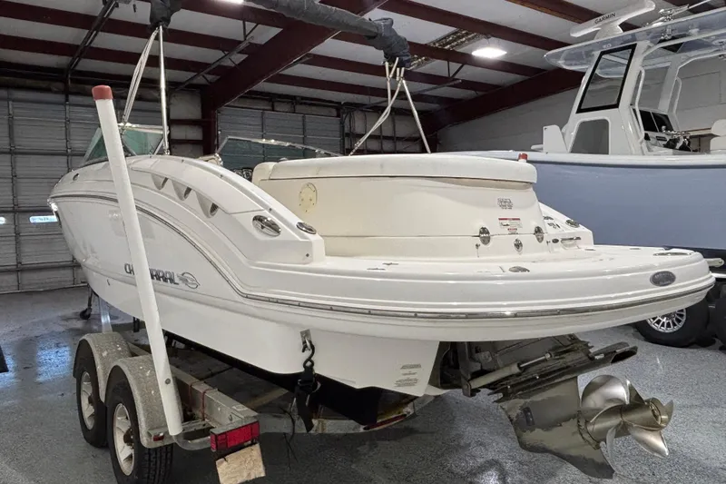 Slide: The Image of 2008 Chaparral 236 SSX boat on trailer in indoor storage facility. - 4