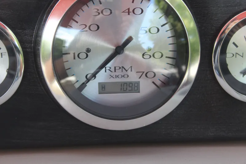 Slide: The Image of Close-up of a tachometer showing 109.8 RPM. - 16