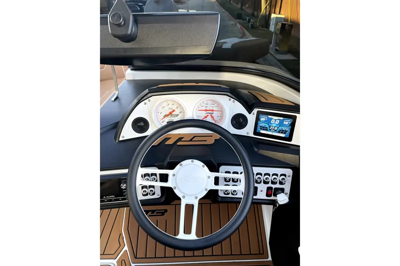Slide: The Image of Dashboard of 2021 MB F24 Tomcat Alpha boat with steering wheel and gauges. - 8
