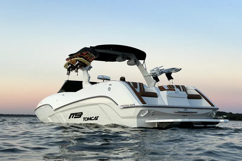 Slide: The Image of 2021 MB F24 Tomcat Alpha boat on water at sunset. - 7
