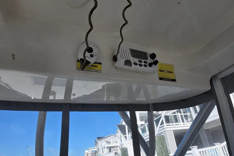 Slide: The Image of Interior view of a 2004 Wellcraft 252 Coastal boat with radio equipment. - 21