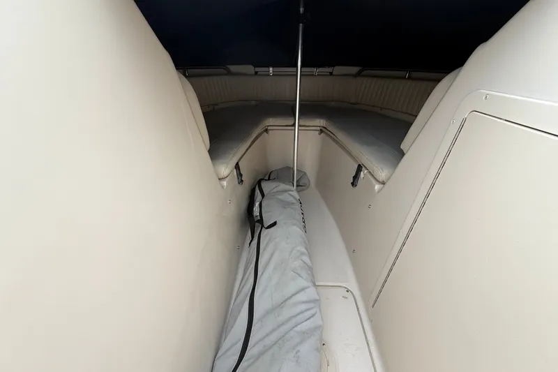 Slide: The Image of Interior view of a 2007 Grady-White Tournament 205 boat cabin. - 13