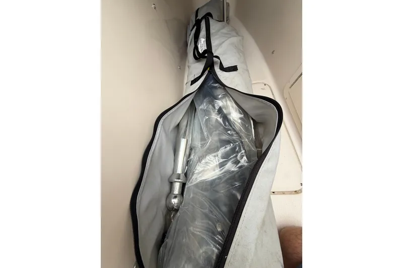 Slide: The Image of Storage compartment on a 2007 Grady-White Tournament 205 boat with equipment bag. - 20
