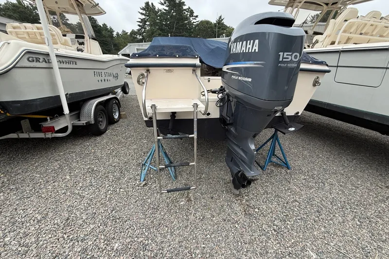Slide: The Image of 2007 Grady-White Tournament 205 boat with Yamaha 150 engine on gravel lot. - 33