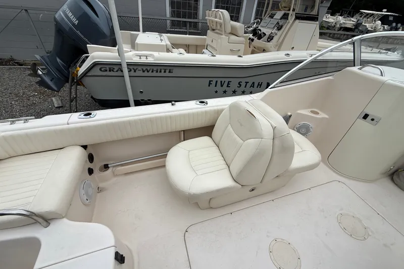 Slide: The Image of 2007 Grady-White Tournament 205 boat interior with seating and Yamaha engine. - 17