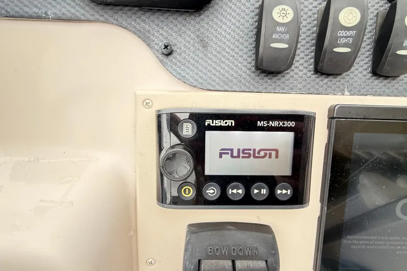 Slide: The Image of Fusion MS-NRX300 stereo system on 2007 Grady-White Tournament 205 boat dashboard. - 24