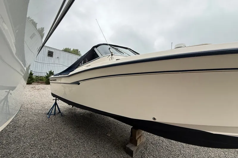 Slide: The Image of 2007 Grady-White Tournament 205 boat on stands, side view, outdoors. - 5