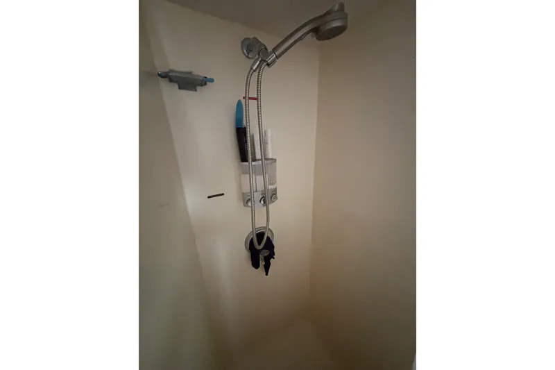 Slide: The Image of Shower area in 1969 Hatteras 38 Double Cabin yacht with handheld showerhead. - 28