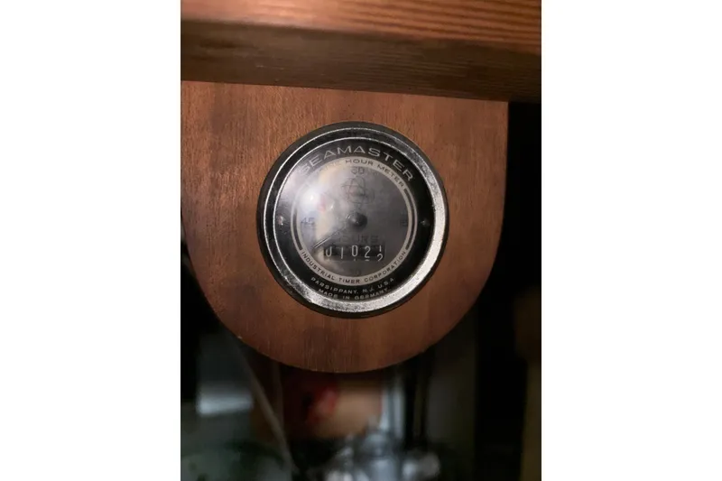 Slide: The Image of Hour meter on 1969 Hatteras 38 Double Cabin boat dashboard. - 33