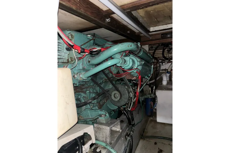 Slide: The Image of Engine room of 1969 Hatteras 38 Double Cabin with visible wiring and components. - 35