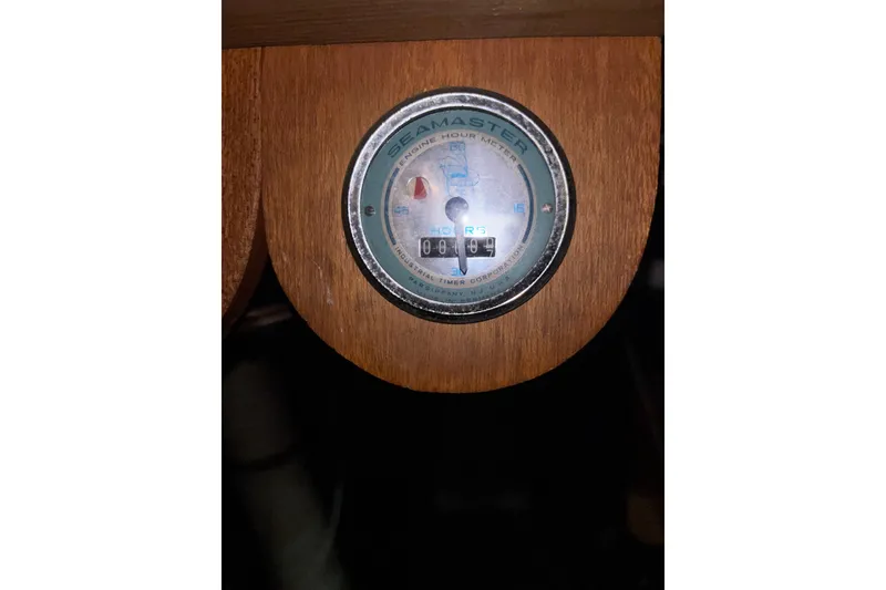 Slide: The Image of Engine hour meter on 1969 Hatteras 38 Double Cabin boat dashboard. - 32