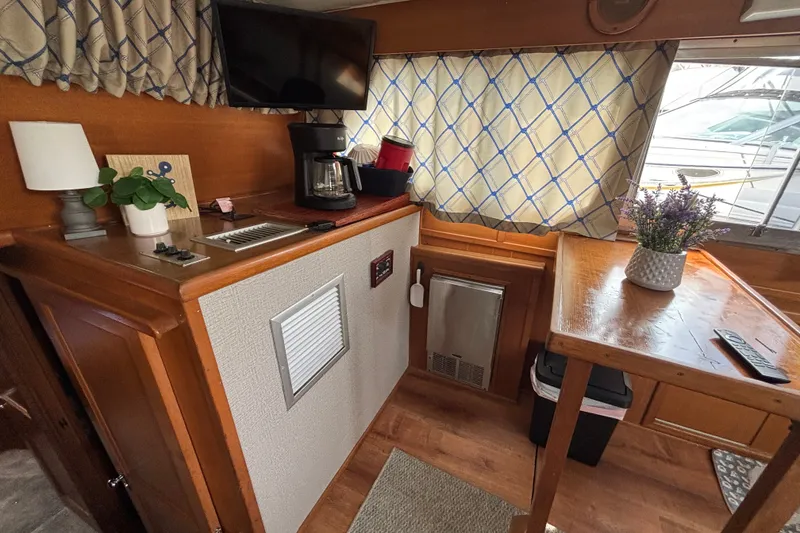 Slide: The Image of Interior of 1969 Hatteras 38 Double Cabin with cozy decor and modern amenities. - 15
