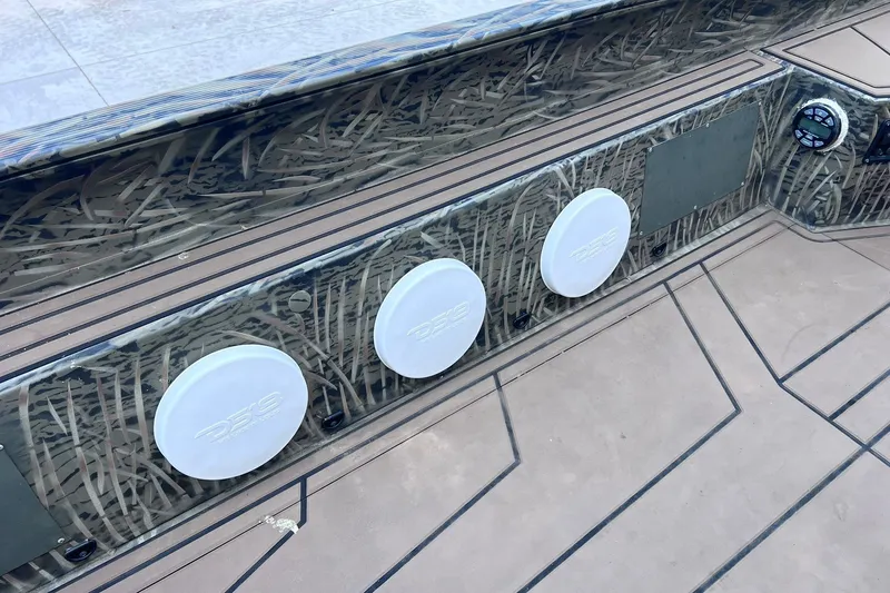 Slide: The Image of 2025 Tracker Grizzly 1650 T Prairie Wings Edition boat interior with camo design and speaker system. - 13