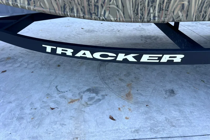 Slide: The Image of 2025 Tracker Grizzly 1650 T Prairie Wings Edition boat trailer with camouflage design. - 27