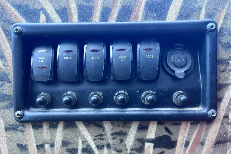 Slide: The Image of Control panel of 2025 Tracker Grizzly 1650 T Prairie Wings Edition boat. - 16