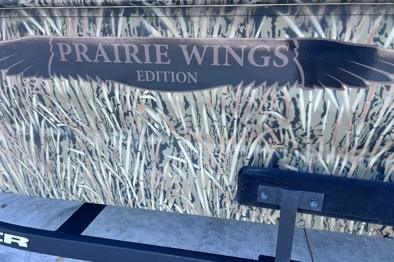 Slide: The Image of 2025 Tracker Grizzly 1650 T Prairie Wings Edition with camouflage design. - 20