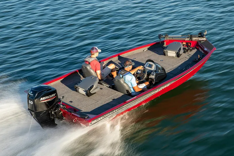 Slide: The Image of Manufacturer Provided Image: 2020 Lowe Stinger 175C boat cruising on water with two passengers. - 14